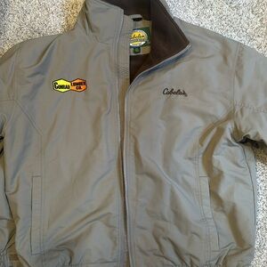 CABELAS BEIGE OUTDOOR  with Conrad Lumber co patch